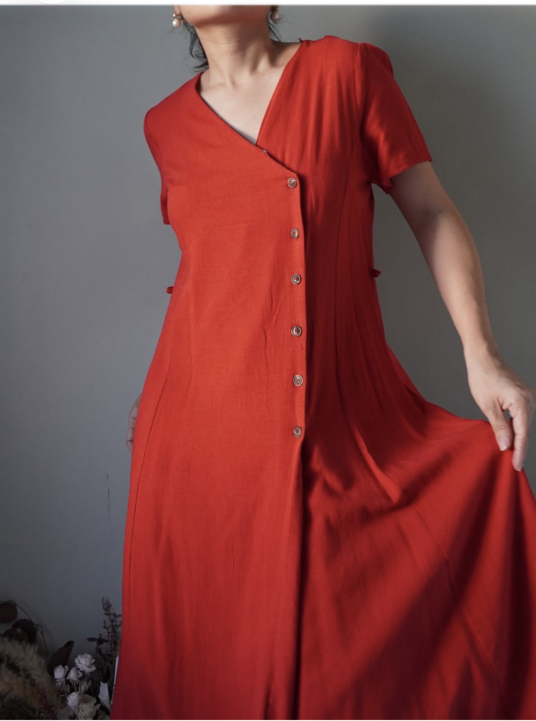 Solid and vibrant candy red side button down dress