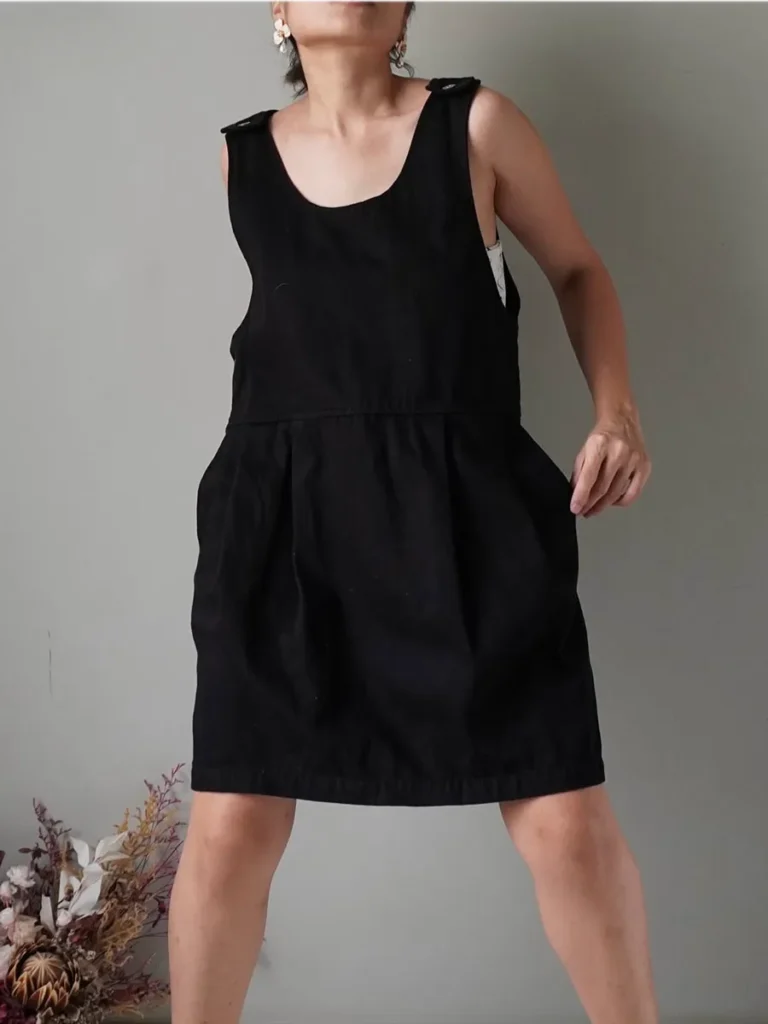 Easy black denim short dress with side pockets