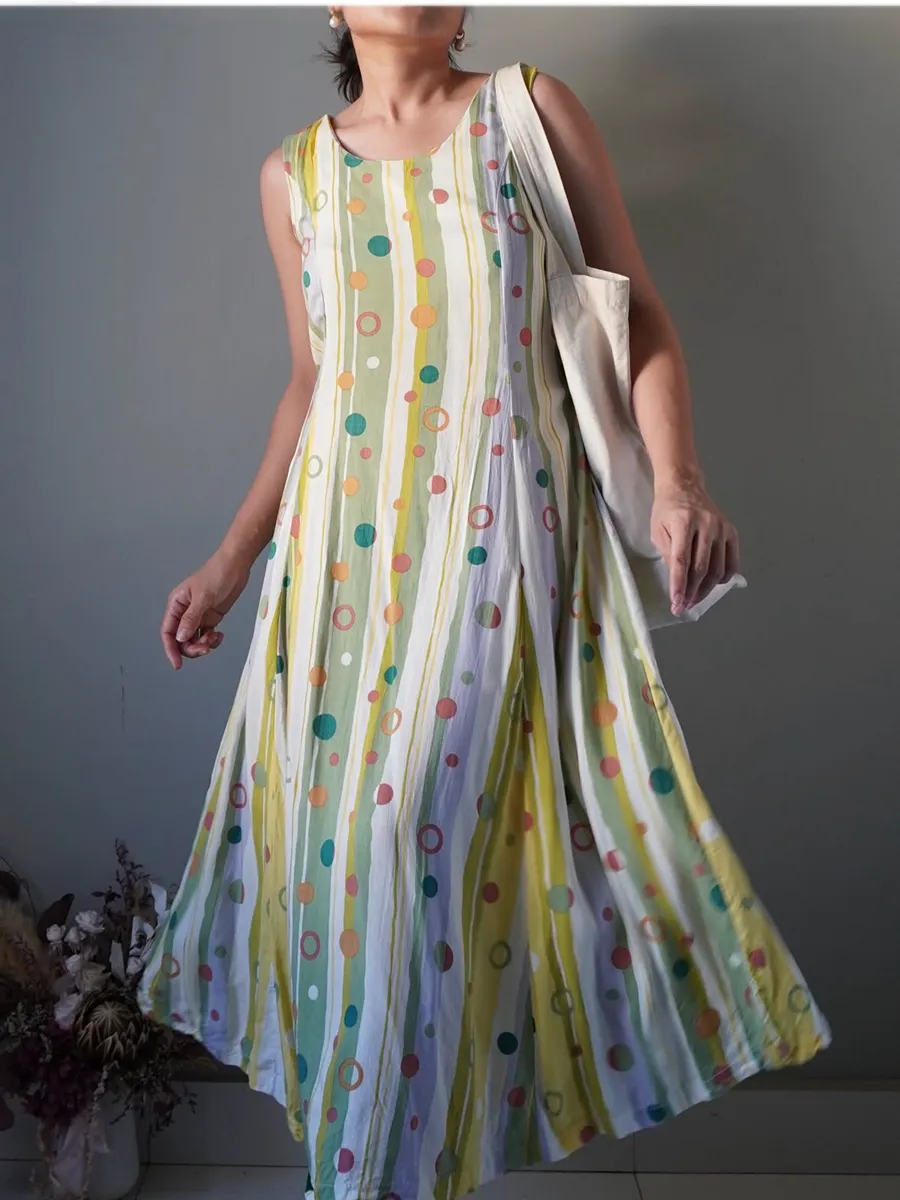Retro multi colored flowy dress with a self tie ribbon at the back - Image 1