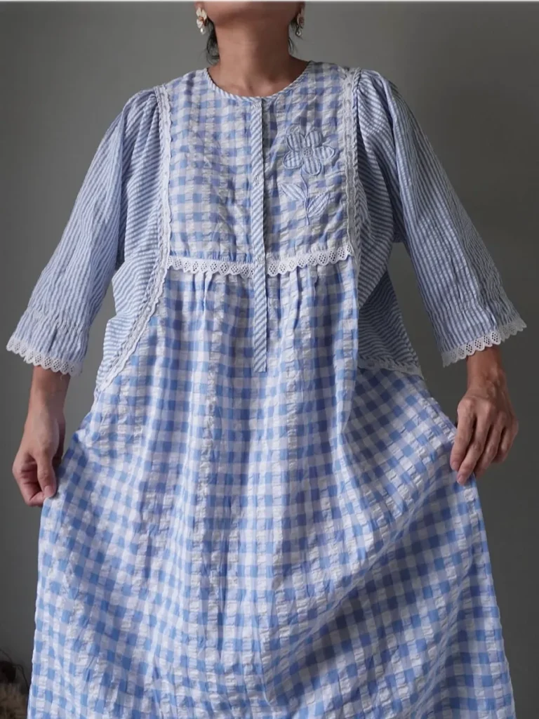 powder blue gingham and stripe blended pattern dress with texture and lace accents