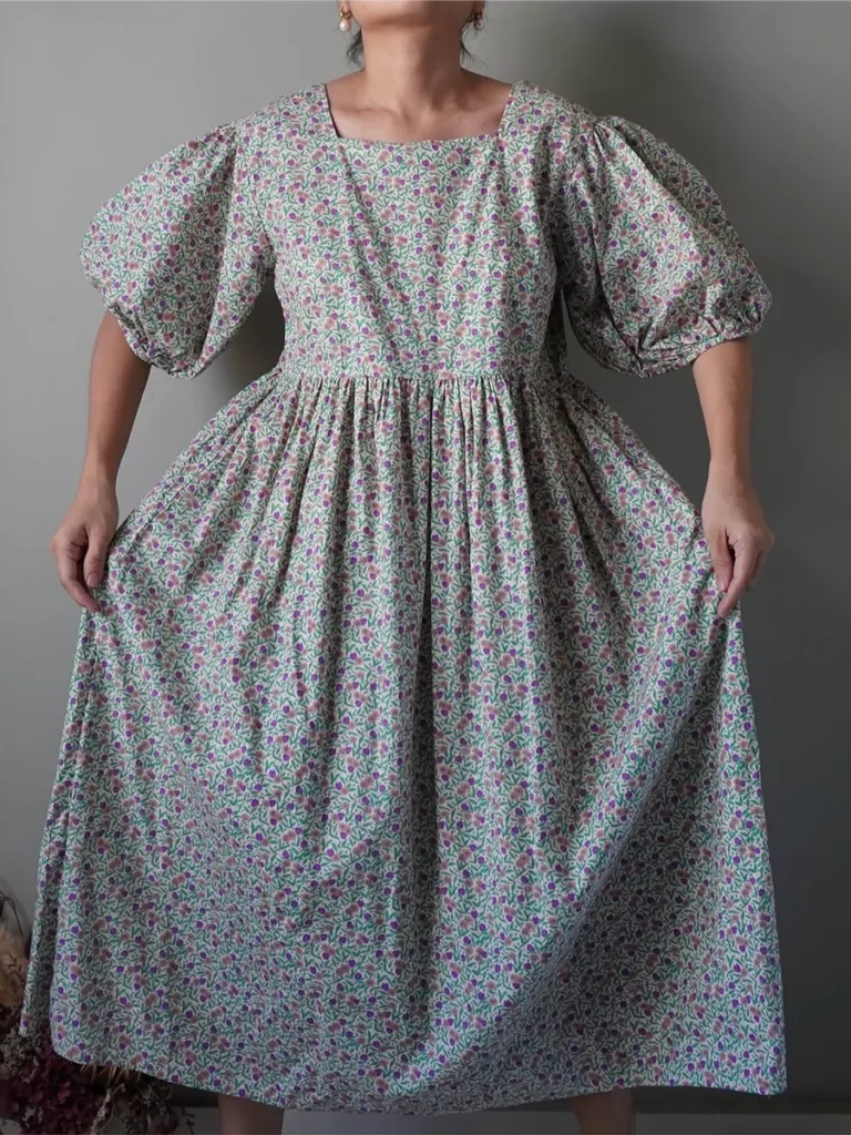 Whimsical garden florals babydoll dress with the most amusing puffy sleeve