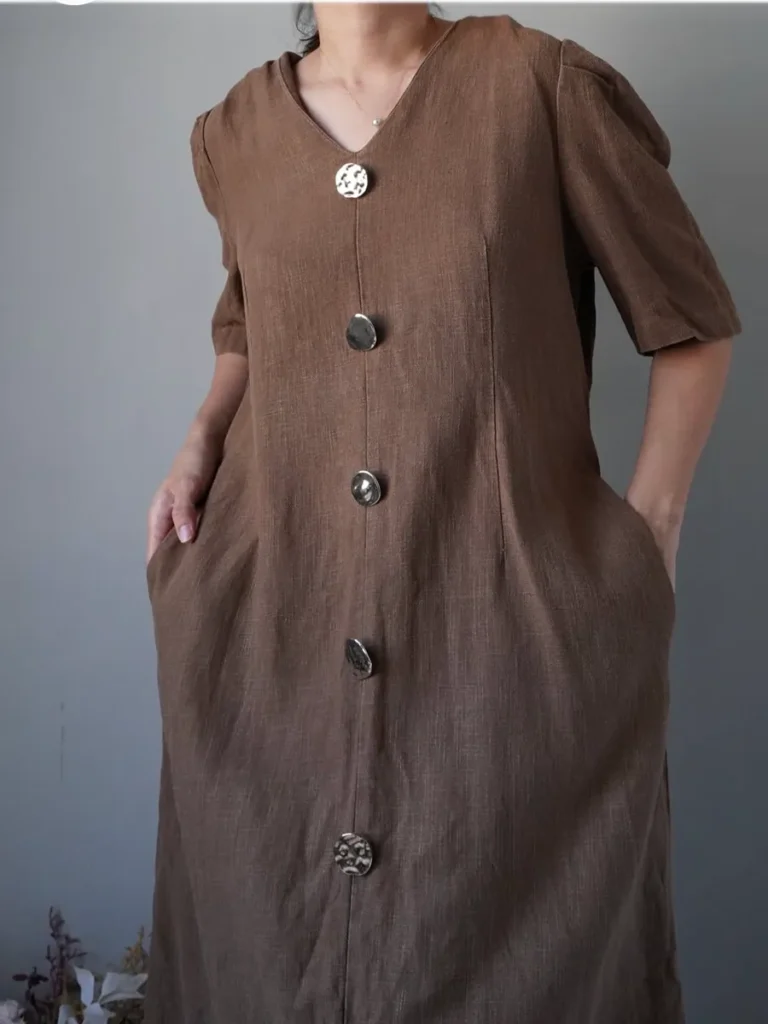 Chocolate brown linen dress with slit at the middle and side pockets