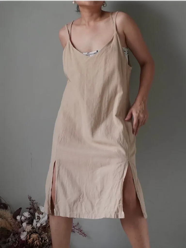 Beige double breasted slip on dress, crisscross back