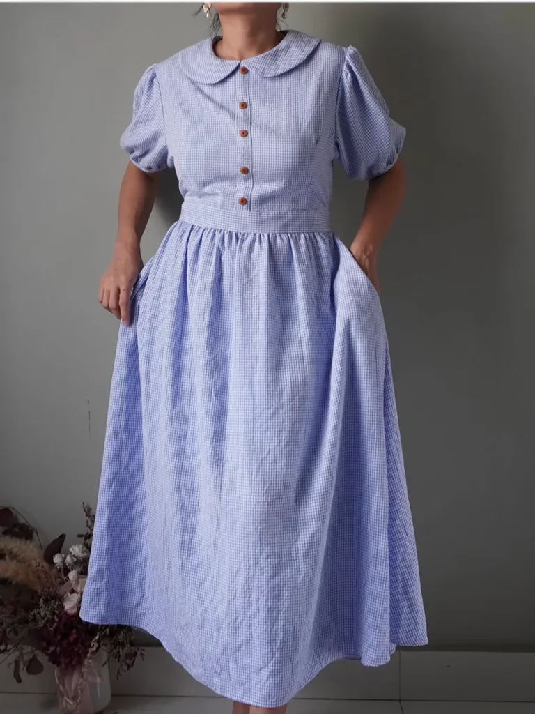 Countryside gingham patterned dress in maya blue, puffed sleeves, classic collar, defined bodice and back zipper