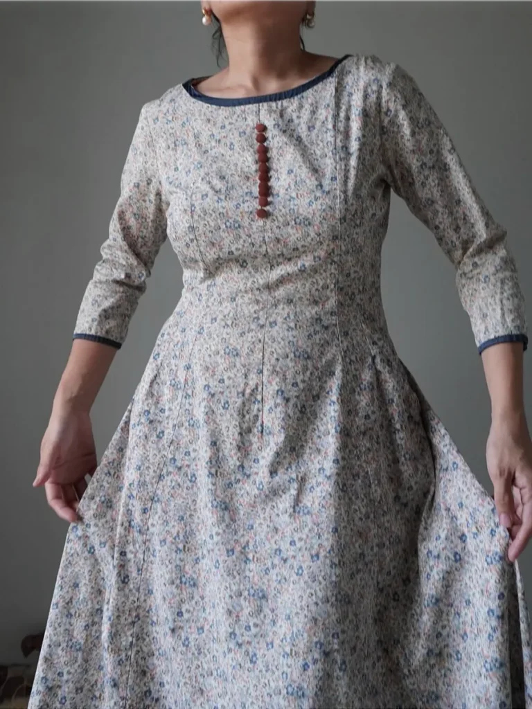 Most elegant cottage core dress with buttons details and quarter sleeves and side pockets