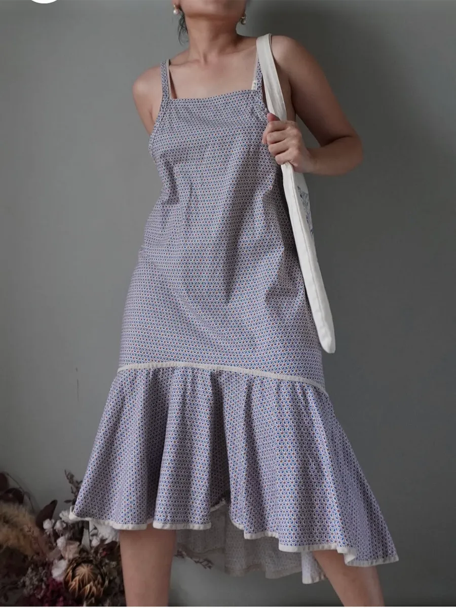 Geo patterned mermaid dress with low back detail - Image 1