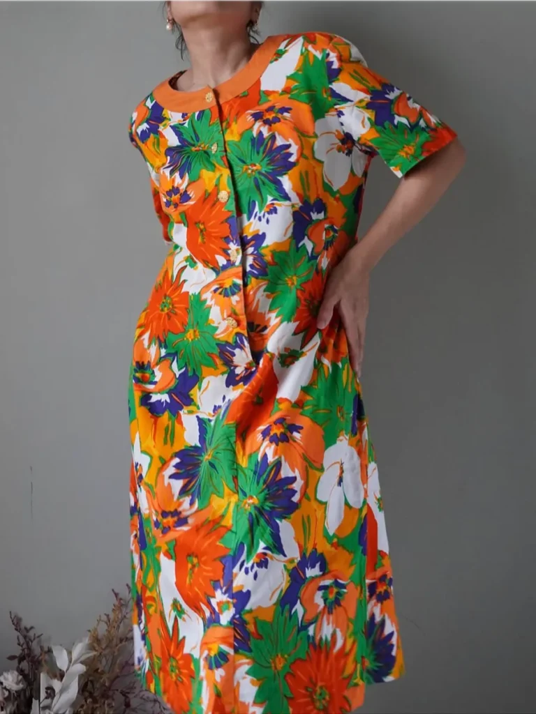 Vibrant retro floral patterned dress with buttons