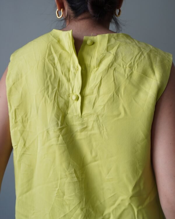 Bright yellow edgy dress with front pockets, has a bluish discoloration - Image 4