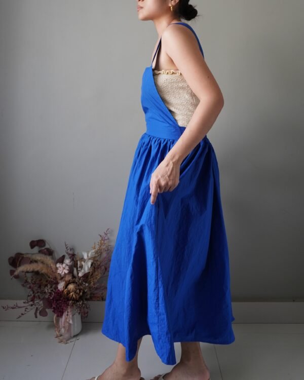 Solid crayola blue pinafore with pockets and crisscross back detail - Image 3