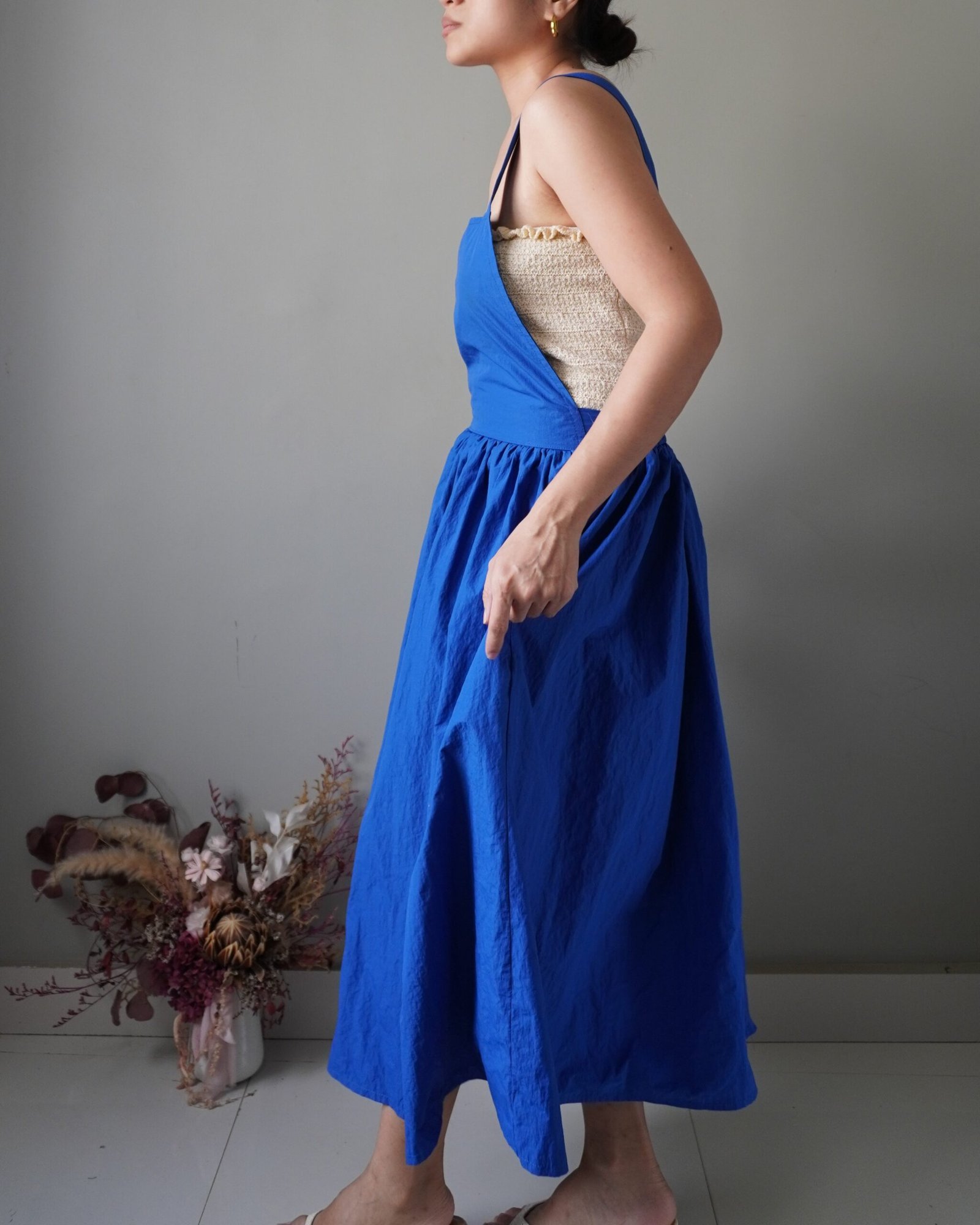 Solid crayola blue pinafore with pockets and crisscross back detail - Image 3