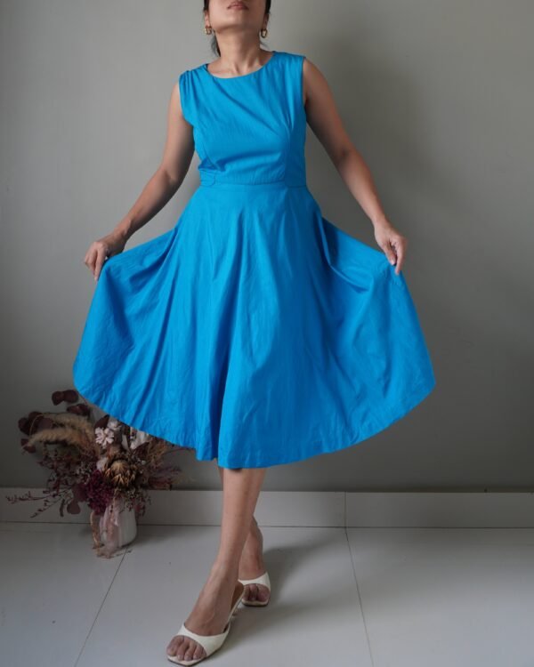 A piece that goes beyond time and seasons, very classic vibrant blue dress which is also very flowy - Image 1