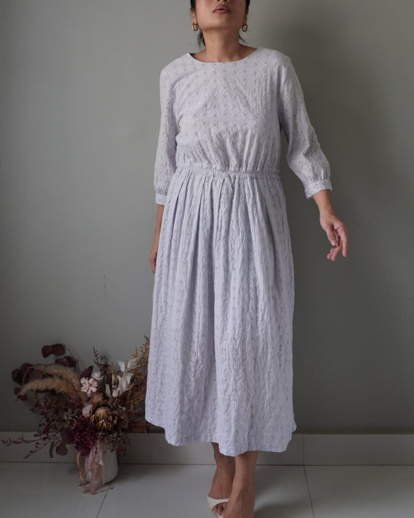 Powder blue dainty eyelet dress with quarter sleeves, waist is stretchable