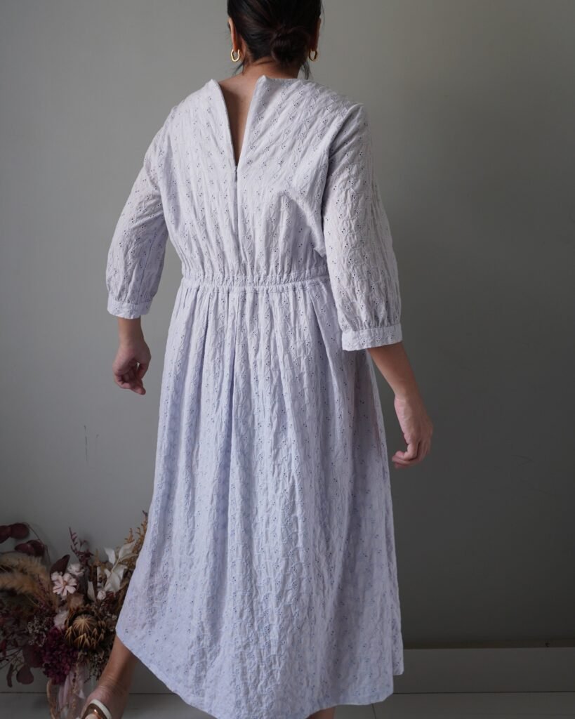 Powder blue dainty eyelet dress with quarter sleeves, waist is stretchable