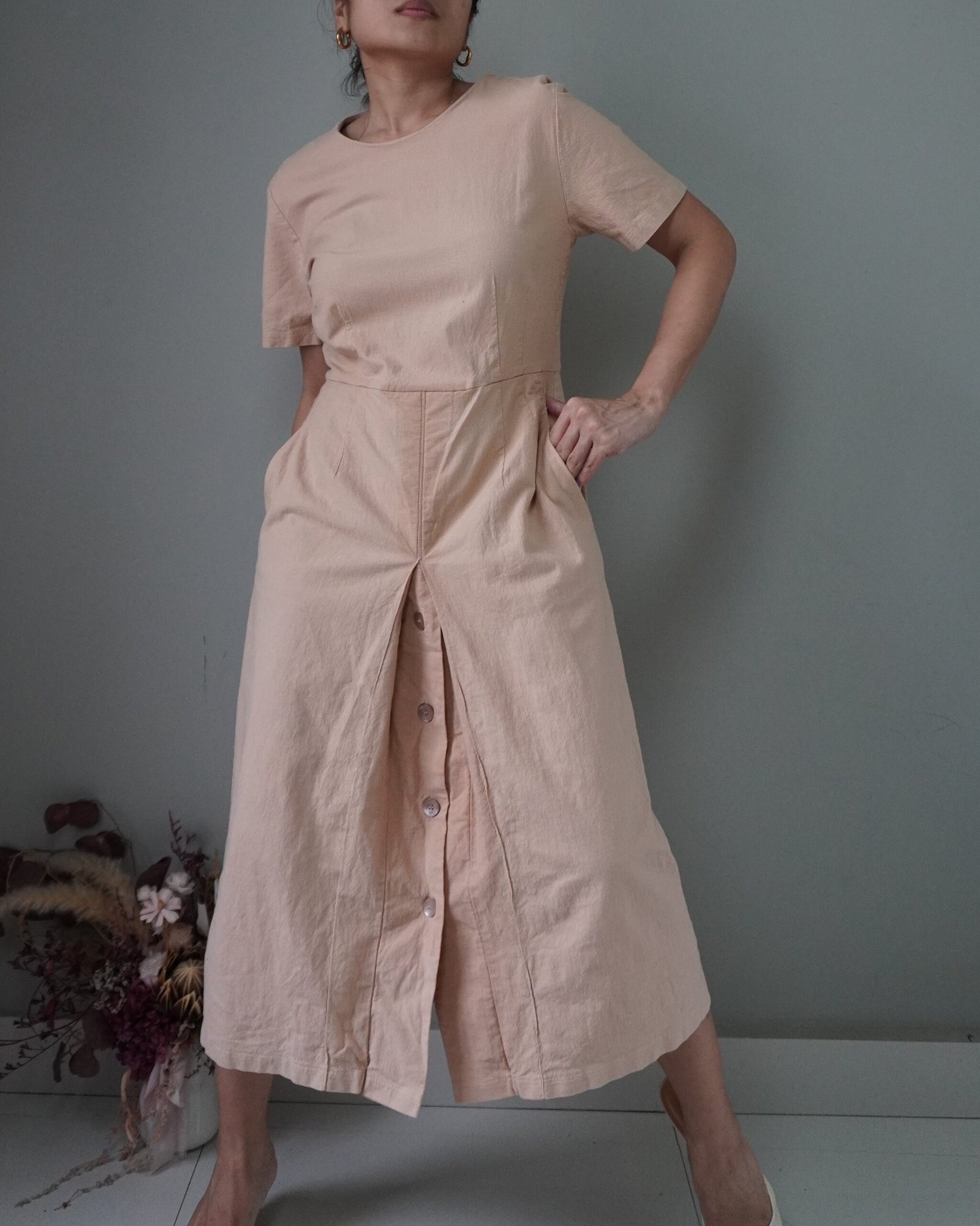 This is a beautiful botanical babydoll dress with collar and drawstring at waist - Image 1