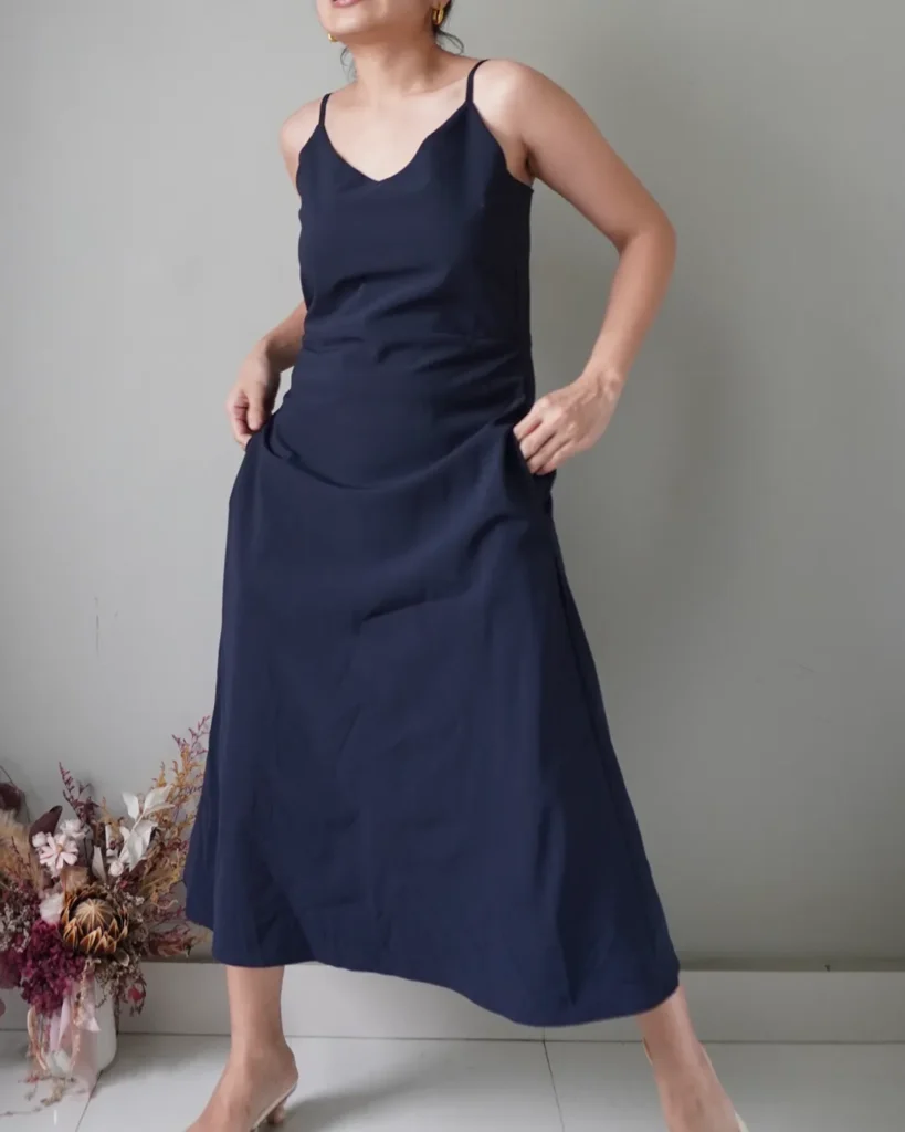 Midnight blue slip on dress that has a self tie ribbon at the back