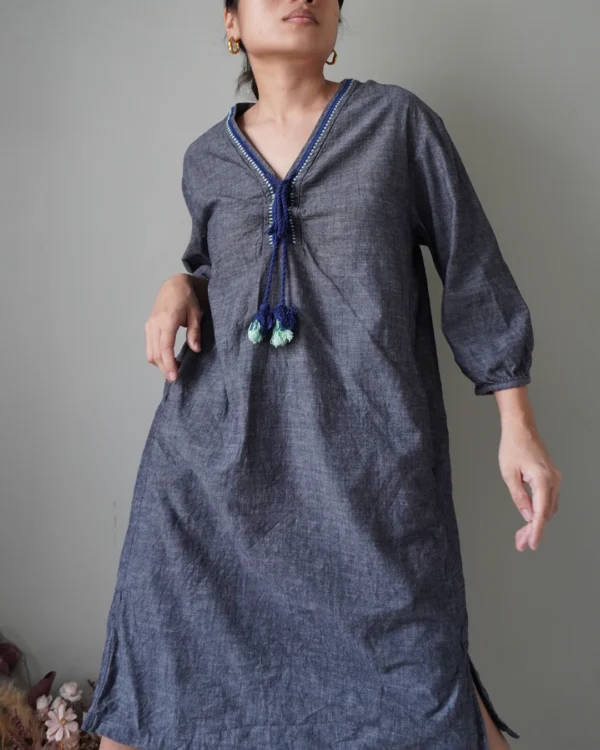 a bluish gray linen casual dress with functional pockets and the prettiest tassel deets - Image 1
