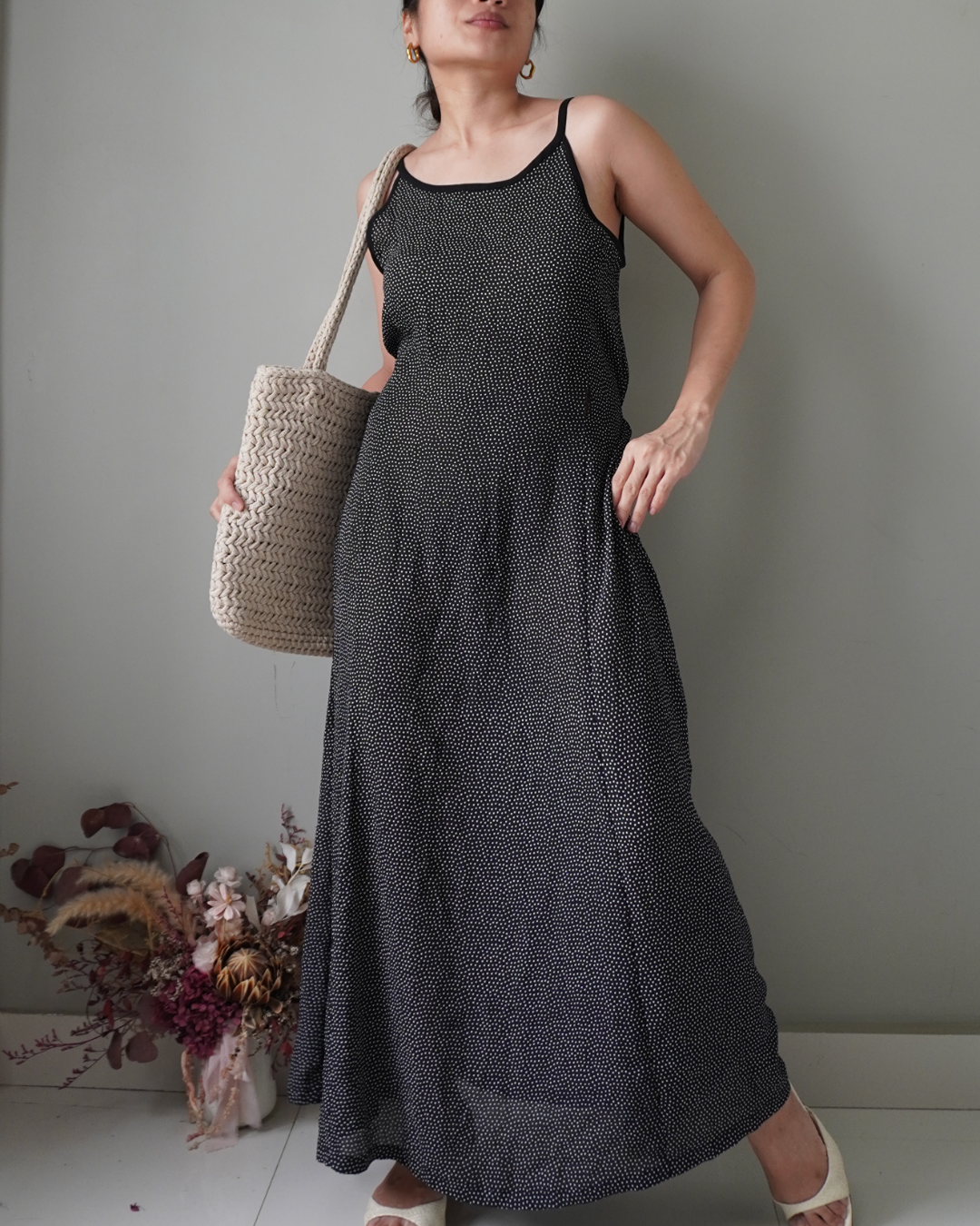 Black polka patterned dress with back zipper and ribbon that ties to the back, has few removed hems that’s reworkable - Image 1
