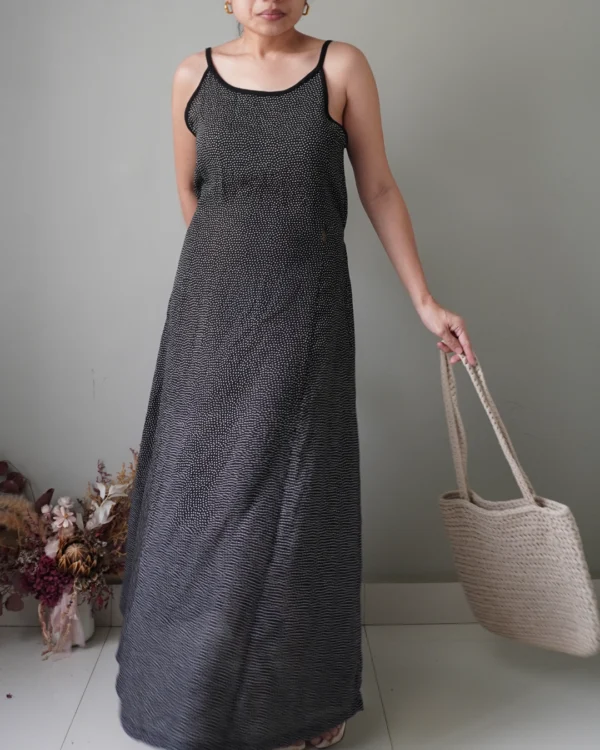 Black polka patterned dress with back zipper and ribbon that ties to the back, has few removed hems that’s reworkable - Image 2