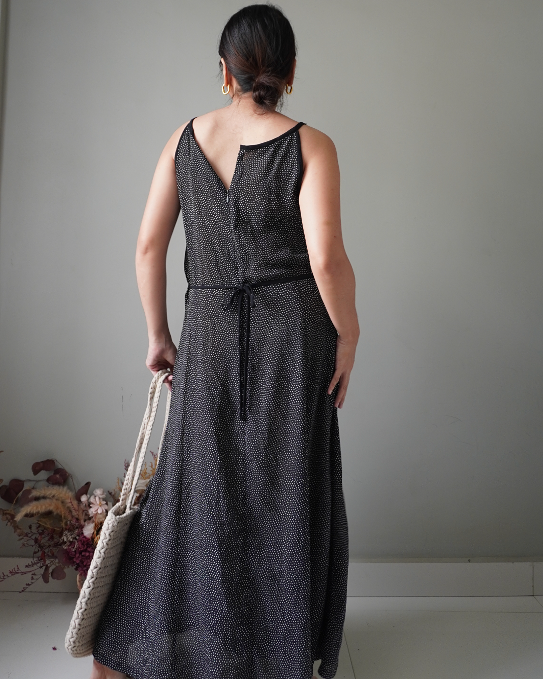 Black polka patterned dress with back zipper and ribbon that ties to the back, has few removed hems that’s reworkable - Image 3