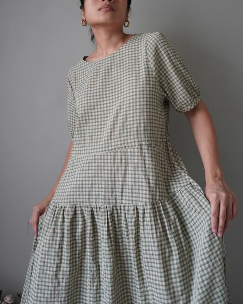 That old-school classic plaid pattern in the most subtle and quiet shade of green, drop waist, has drawstring to cinch waist area