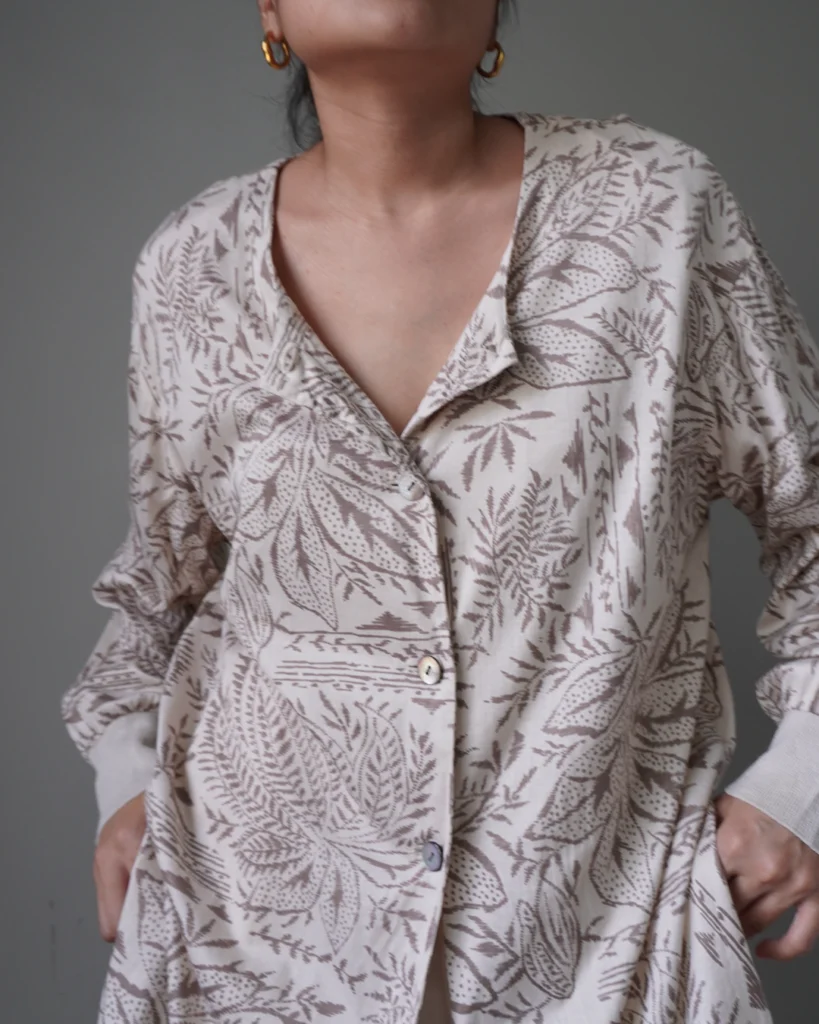 Botanical patterns in a calm neutral shade, button down oversized loose drop top. Effortless and chic