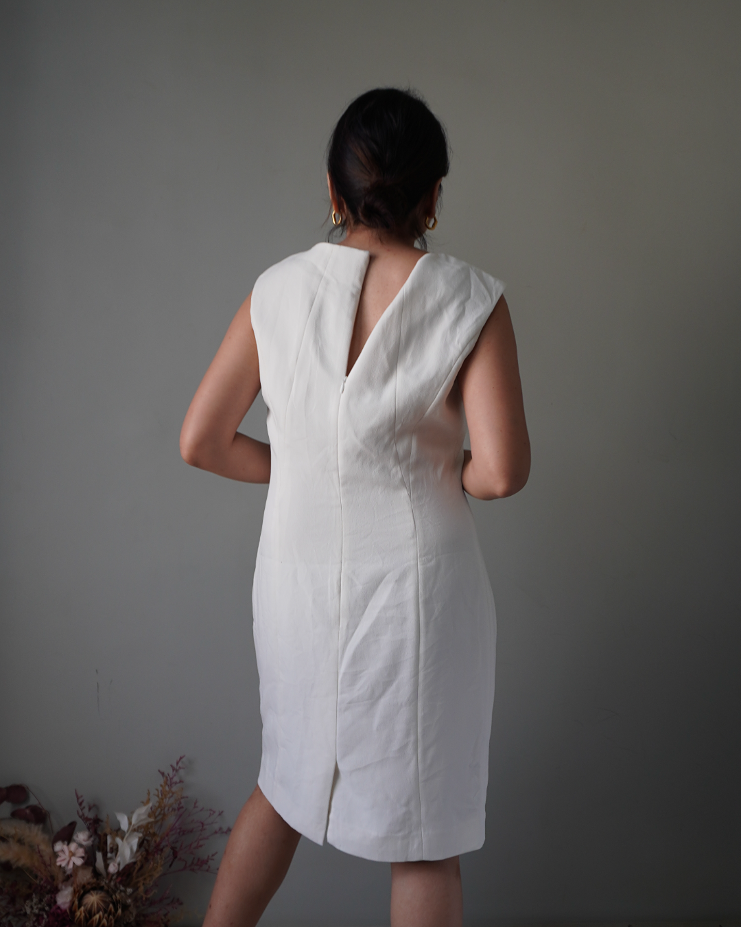Elevated with pleat accents, edgy white sleeveless dress with zipper at the back - Image 3