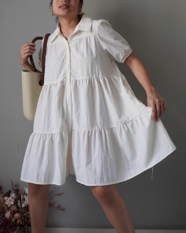Cream babydoll button down dress with tiered details, shape-friendly - Image 2